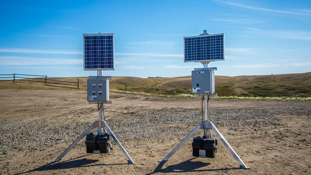 Portable solar power skids for off-grid flare stack ignition and monitoring systems rental in remote oilfield locations.
